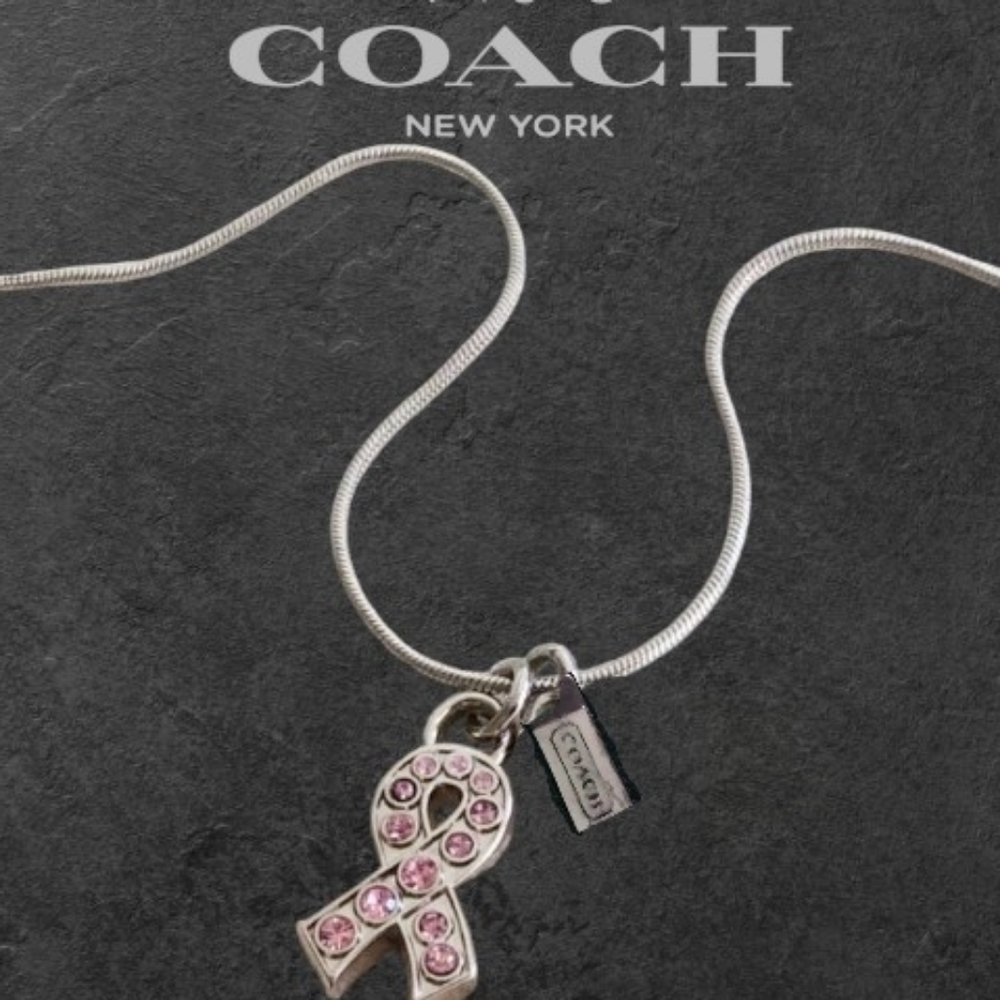 Coach Silver Necklace with Pink Gem Ribbon Pendant
